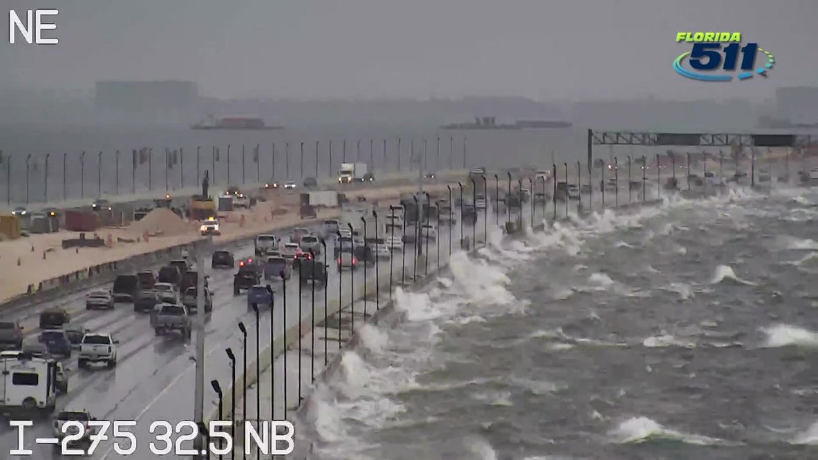 Waves crash alongside Howard Frankland Bridge